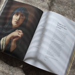 Open Catholic prayer book with prayer to Our Lady of Sorrows